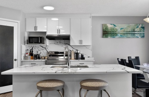 Airdrie House | Luxury Urban Oasis in Prime Location