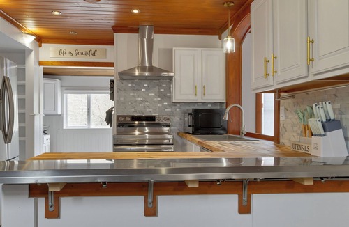 East Hill House | Main House - Spacious Modern Retreat w/Wood Accents - Sleeps 12