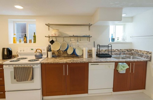 Saanich East House | Melrose Haven Private Queen Room with Heated Pool