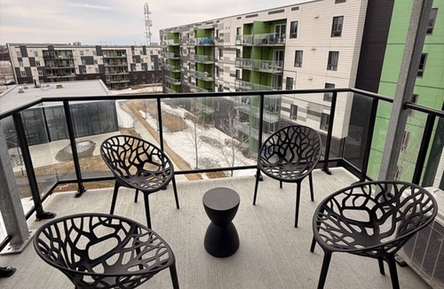 Plateau Apartment | Modern 1BD Suite at Le Prisme w/Private Balcony, Pool, Gym & Yoga Studio