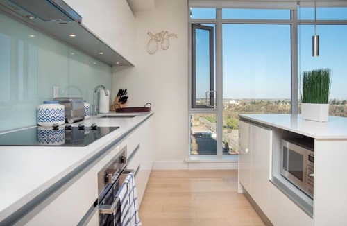 Victoria Park House | Modern 2 BR Near Stampede Rooftop Patio Gym