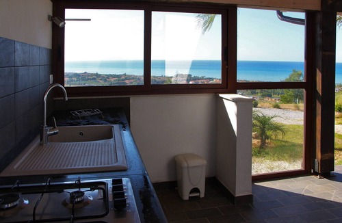 Campofelice di Roccella Villa | Modern property with Private Golf Practice, Private Pool, Garden, WiFi, Sea VIew