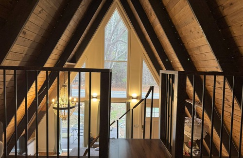 Bynum House | Modern Luxury A-Frame Retreat on a 2-acre Pond. Weekly & monthly discounts.