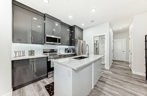 Northwest Edmonton House | Modern Oasis w/AC Sleeps 6 Garage Parking Near WEM