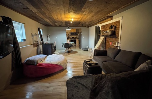Merritt House | Nestled into the mountains, relax under the star in the hot tub