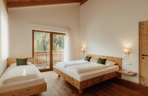 Selva dei Molini Apartment | New Penthouse Zirm at Untermairhof with Mountain Views, Private Terrace & Large Dining Room
