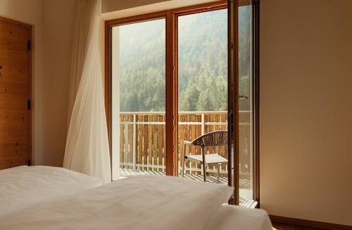Selva dei Molini Apartment | New Penthouse Zirm at Untermairhof with Mountain Views, Private Terrace & Large Dining Room