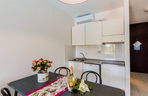 Marina di Bibbona Apartment | Nice apartment for 4 people with pool, A/C, WIFI, TV, terrace and pets allowed