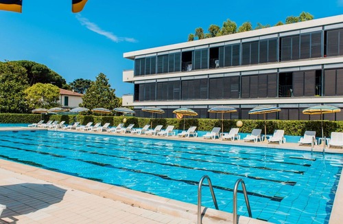 Marina di Bibbona Apartment | Nice apartment for 4 people with pool, A/C, WIFI, TV, terrace and pets allowed
