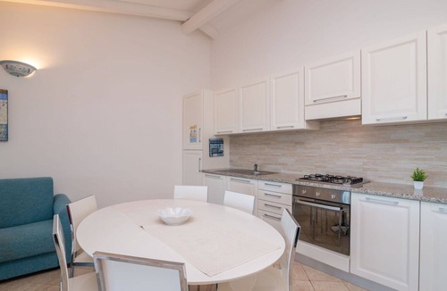 Porto Pozzo Apartment | Nice apartment for 6 guests with WIFI, pool, A/C, terrace and pets allowed