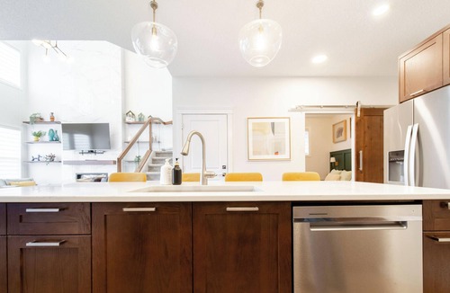 West Edmonton House | Nordic Retreat near WEM | Hot Tub, 2 Lounges, Fire Table, King Suite Sleeps 10