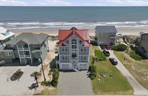 North Topsail Beach House | Oceanfront home with volleyball, game room, pool, beach access & washer/dryer