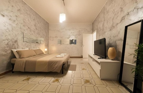 Quartiere XXIII Alessandrino Apartment | Oleandri Concept Apartment