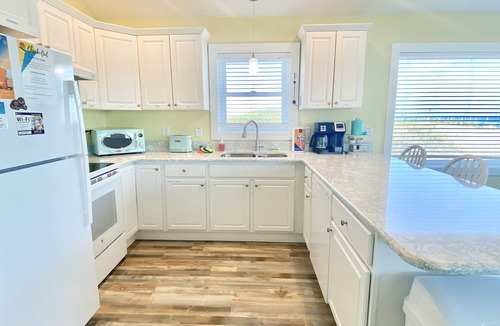 Sea Retreat House | Panoramic Ocean Views in this Updated Vintage Beach Cottage Right on the Beach!