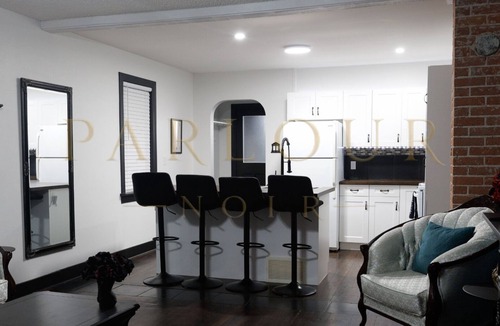 Northeast Edmonton House | Parlour Noir: A Darkly Divine Sanctuary Perfect For Spicy Staycations