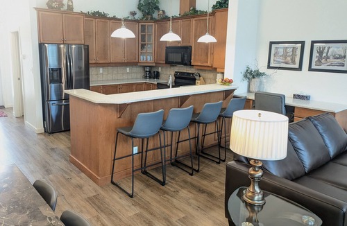 North End Condo | Pool Level Walkout condo- Balcony with the lagoon/Lake Views