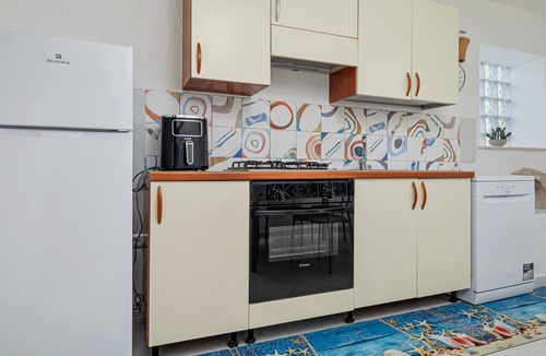 Rudalza Apartment | Porto Rotondo Garden Apartment with Mountain View, Wi-Fi, and Air Conditioning
