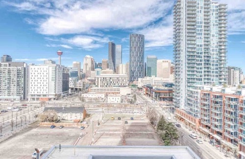 East Village Condo | Postcard Views w/Chic Decor, Office, Parking
