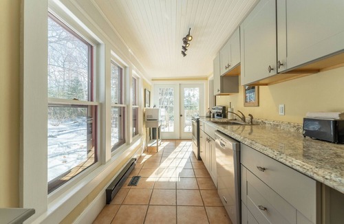 Saint Patrick Cottage | Private 2 Bedroom Historic Home with Fireplace & Fenced Yard. Pet-Friendly!