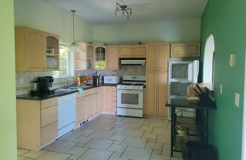 Sliammon House | rainforest suit with a king size bed Ocean views and 10 minutes to private beach