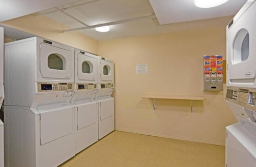 Quartier des Spectacles House | Rare Find! 4 Comfortable Units, Full Kitchen, Close to Chinatown
