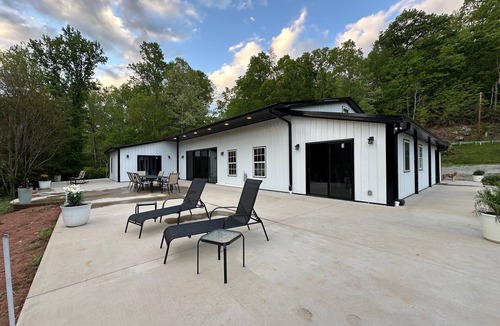 Mills River House | Rippling Waters! 3 BD 2.5 BA Riverfront Home, 8 min. from airport. Sleeps 11.