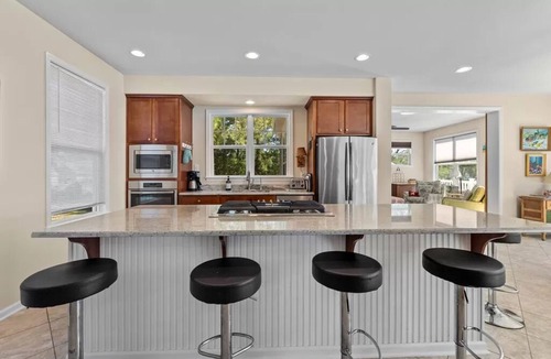 White Stone House | River Beachfront- Spacious Dog & Family Friendly 3 Bedroom Home on Shared Beach