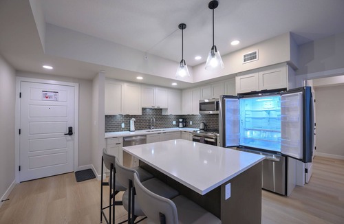 Dead Man's Flats Condo | ☀️Rocky Mountain Creekside Retreat|Top Floor Brand New Unit☀️