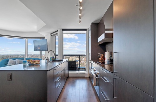 Downtown Edmonton Apartment | Roger - Luxury ICE District Suite - Pool & Parking