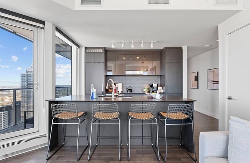 Downtown Edmonton Apartment | Roger - Luxury ICE District Suite - Pool & Parking