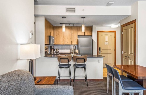 Cougar Creek Condo | Serene 1BR Rockies Retreat w/BBQ, Gym & Hot Tub