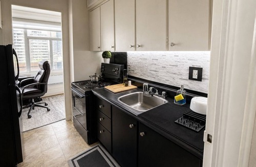 Downtown Toronto Apartment | Skyline 1BR w/Balcony + City Views | High Floor | Steps to Yonge/Bloor!