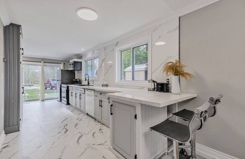 Severn Cottage | Snowmobile-In Riverside Suite with Sauna, Marina, Sleeps 6!