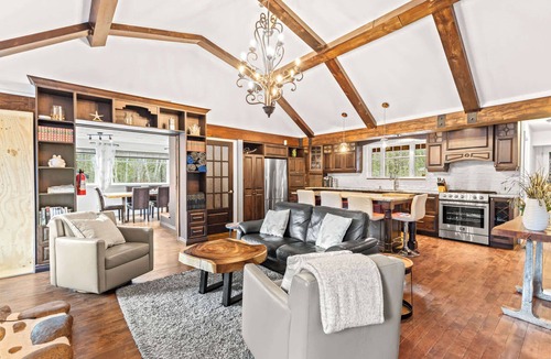 Saint-Brigitte-de-Laval Ski Chalet | Spa & Comfort by the River | Le Riverain