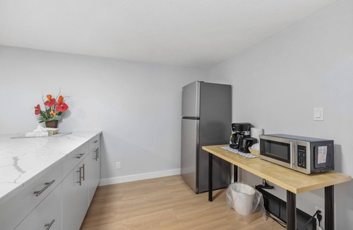 Montgomery House | Spacious basement 2 bedroom suite with private kitchenette and bathroom