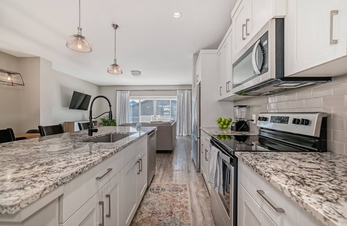 Southeast Calgary House | Spacious Home w/Sauna & Fenced Yard w/BBQ, Pet-Friendly, Sleeps 10, King Beds