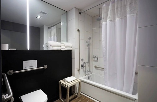 Brossard Hotel | Spacious Room Ideal for Families Near Kid-Friendly Attractions & Dining Options