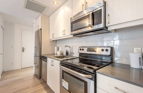 International District Apartment | Square Victoria - Balcony View & Free Parking