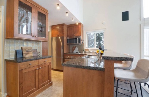 Upper Village Villa | Step onto Ski Hill 3-Bedroom: Hot tub, Parking, AC