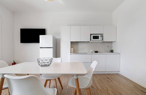 Lido di Jesolo Apartment | Studio Apartment 'Open Space 2' with Shared Garden, Wi-Fi and Air Conditioning