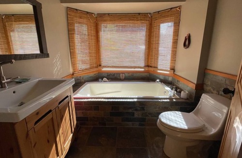 Proctor House | The Nouk - Back to Base Retreat & Wellness - Room with a Queen size bed