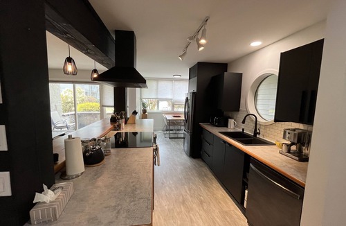 Courtenay Apartment | The River Apartment: Stylish apartment in a Riverfront complex.