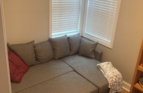 Sumter House | This charming 2-bed, 1-bath house offers a warm sanctuary for those on the go.