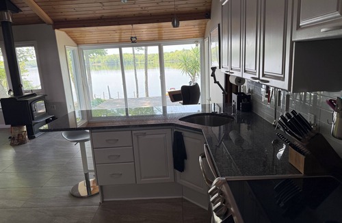 Fall River House | Tranquil, lakeside home, architecturally designed as barrier free dwelling.