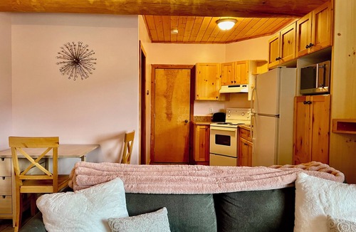 Apex Mountain Condo | True ski in/out with private hot tub and valley views