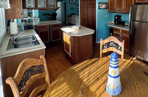 Fentress House | Tulls Bay Getaway - deep water canal location perfect for boating and relaxing!