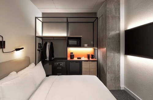 Brossard Hotel | Unwind in Modern Room w/Chic Design + Large Windows in Prime Location | 3 Units