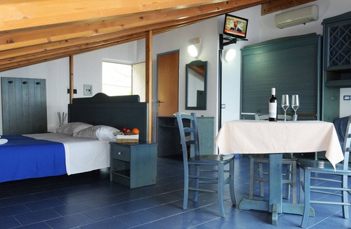 Province of Messina House | Vacation Home "Oasi Azzurra - Monolocale Standard 2" with Shared Pool & Shared Terrace