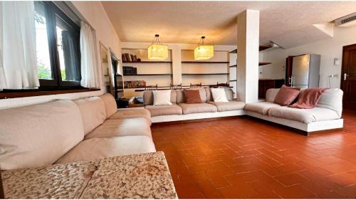 Nord-Est Apartment | Villa degli Olivi 1, Parcheggio privato e zona tranquilla