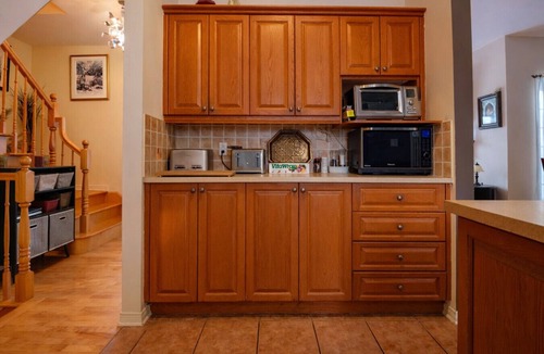 Saint Basile le Grand House | Villa Near Montreal with Heated Pool, BBQ, 4 Bedrooms & 10 Guests